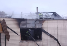 Пожарный вынес газовый баллон из горящего дома в Успенке