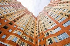 Из-за плавающего курса тенге в Казахстане снизятся цены на вторичное жилье