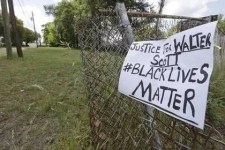 Семье убитого полицейским чернокожего американца выплатят 6,5 млн долларов
