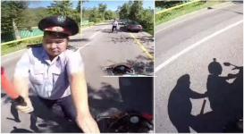 В Алматы бесстрашный инспектор остановил байкера на ходу